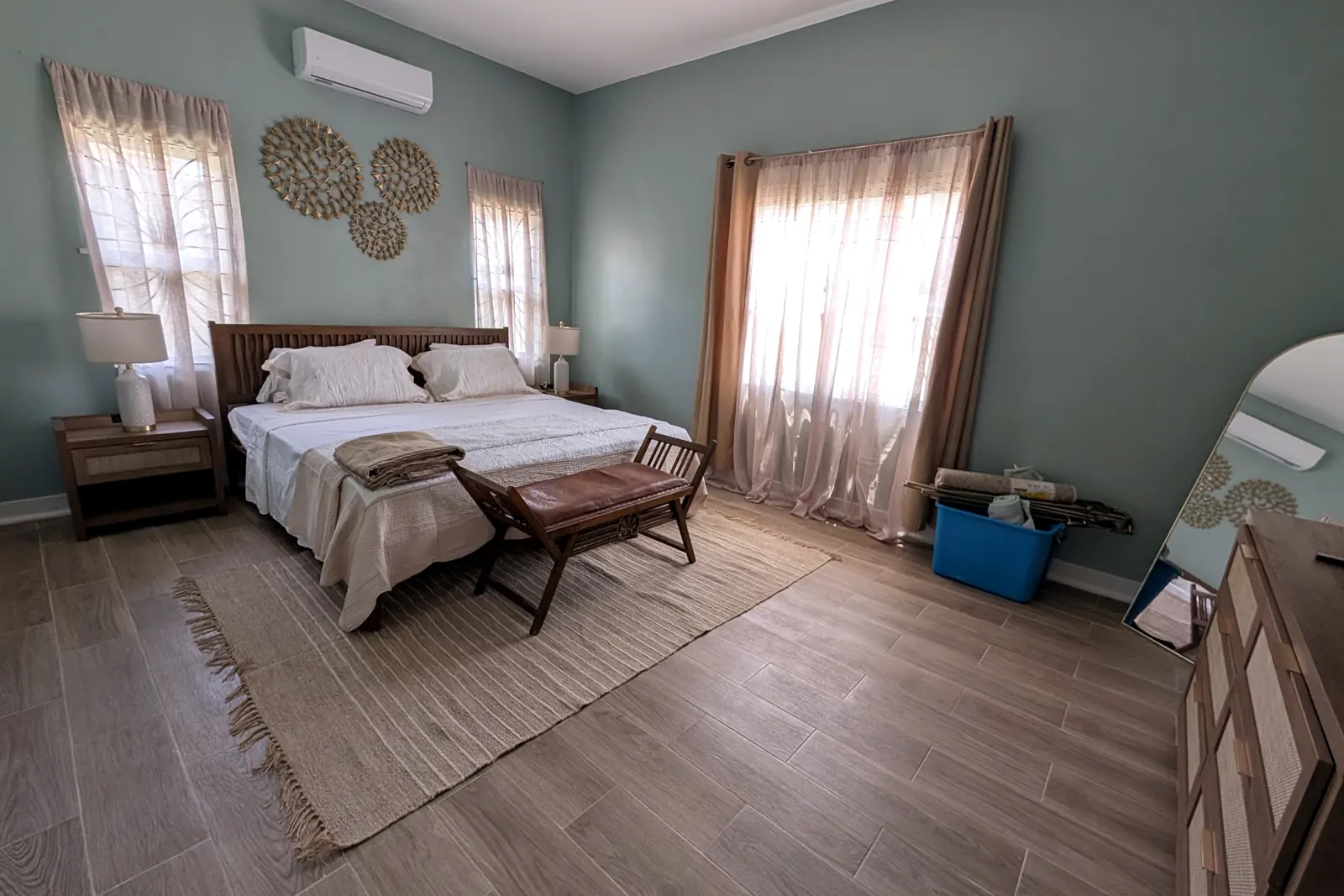 Main bedroom from the doorway, with a jute rug
